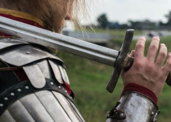 how much does guts sword weigh