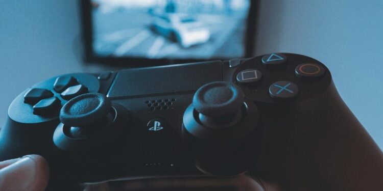 Can the Gaming Industry Recover from A Tough 2024? 9 A close-up of a video game controllerDescription automatically generated